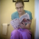 A fat girl with glasses is secretly recorded taking a shit while reading a paper and in a couple of other scenes. About 7 minutes.